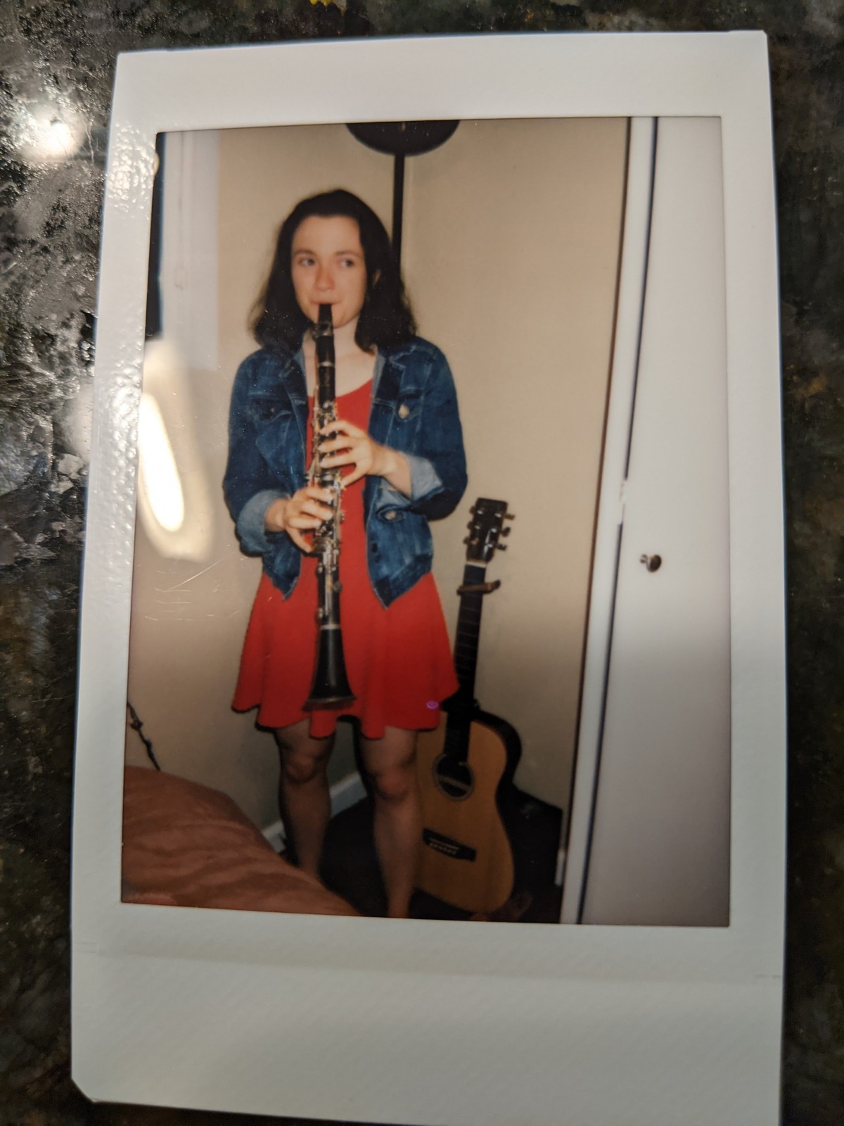 christy and her guitar stand